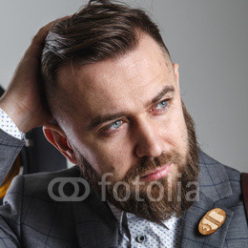 Portrait-of-a-stylish-man-with-a-beard-on-white-background.jpg